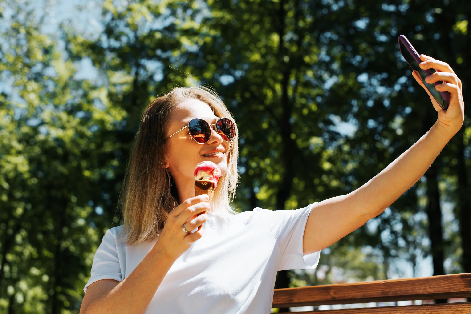 beautiful-young-woman-in-glasses-eats-ice-cream-an-2022-04-07-20-07-50-utc beautiful-young-woman-in-glasses-eats-ice-cream-an-2022-04-07-20-07-50-utc