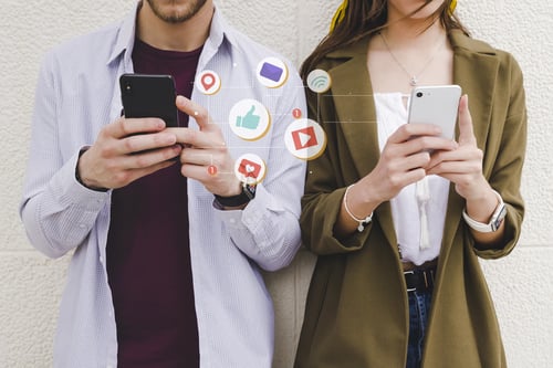 mobile-notification-icons-man-woman-using-cell-phone mobile-notification-icons-man-woman-using-cell-phone